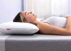 Woman sleeping on her back with a Juno Cooling Gel Pillow