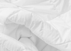 Close-up of the cotton cover on a Juno Down Alternative Duvet