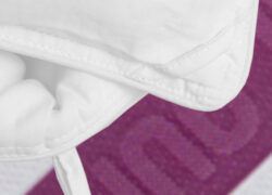 Close-up view of the corner loops of a Juno Down Alternative Duvet