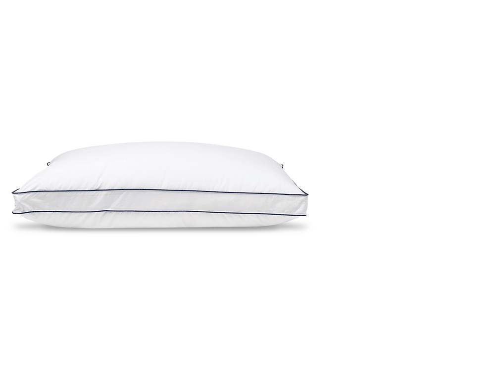Woman sleeping on her side on an Adjustable Memory Foam Pillow