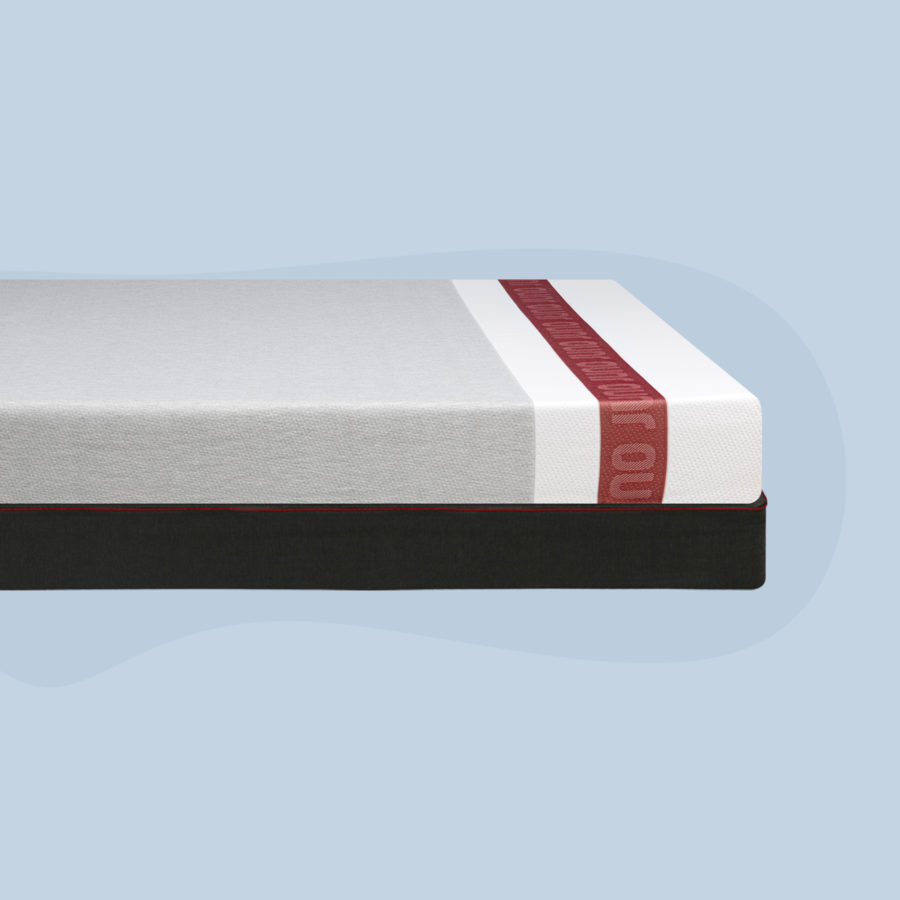 A Juno mattress sits on a solid wood Juno foundation