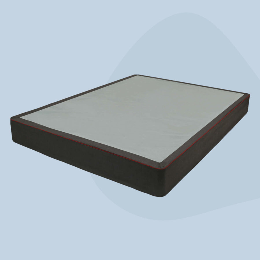An angled view of the solid wood Juno foundation with its cover on.