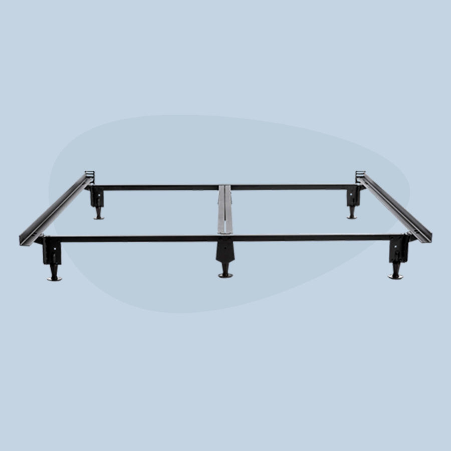 A Juno metal bed frame sits assembled against a light blue background.