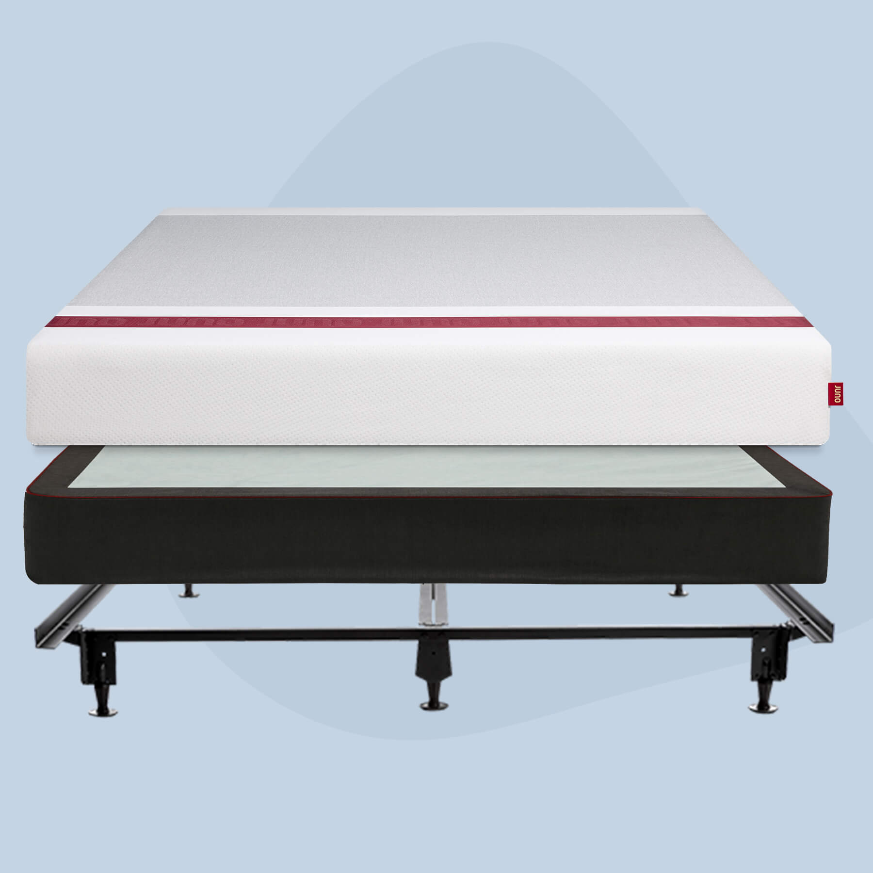 Juno mattress stacked on top of a foundation and metal bed frame