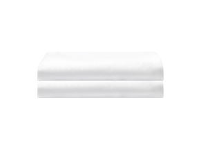 Two pillow protectors that are included with the Juno Comfort Sleep Bundle sit neatly folded