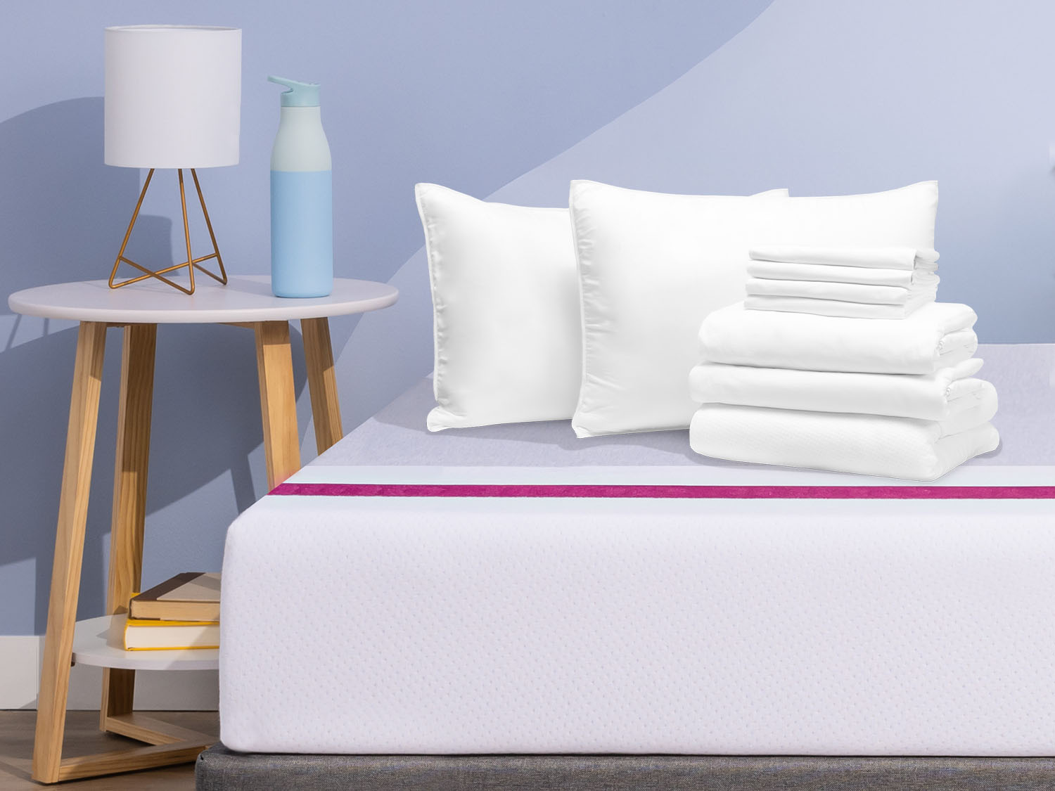 Comfort Sleep Bundle items on top of a Juno mattress