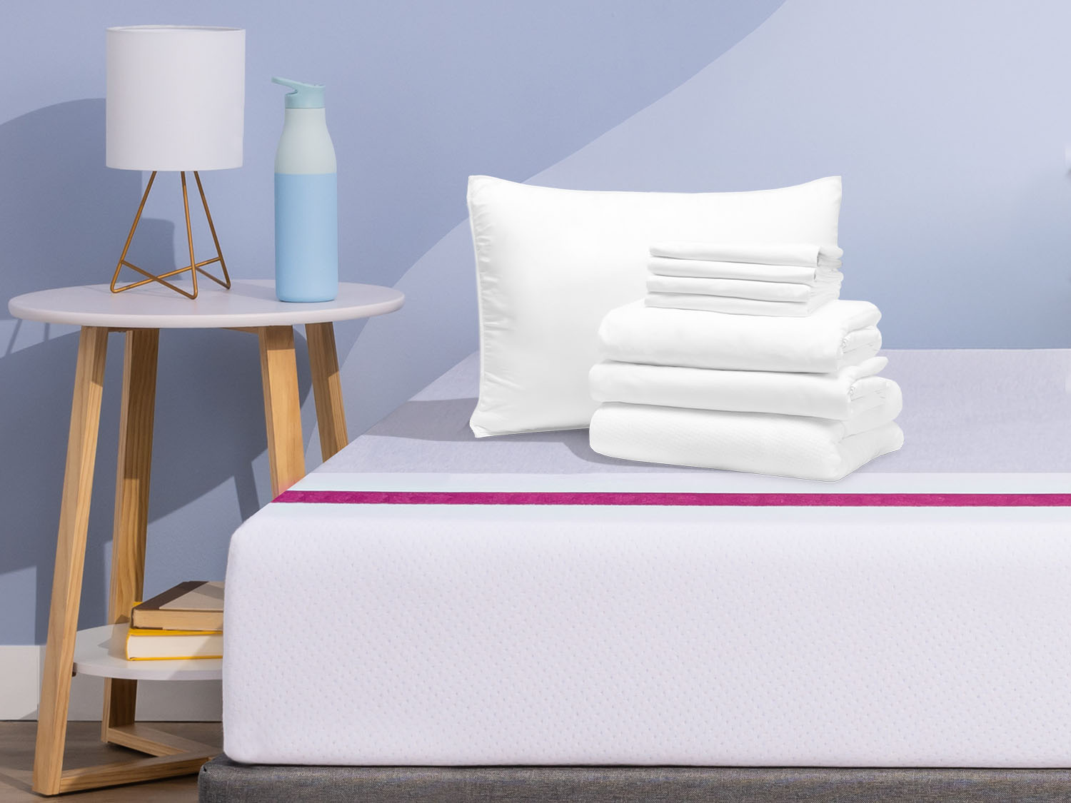 Comfort Sleep Bundle items on top of a Juno mattress