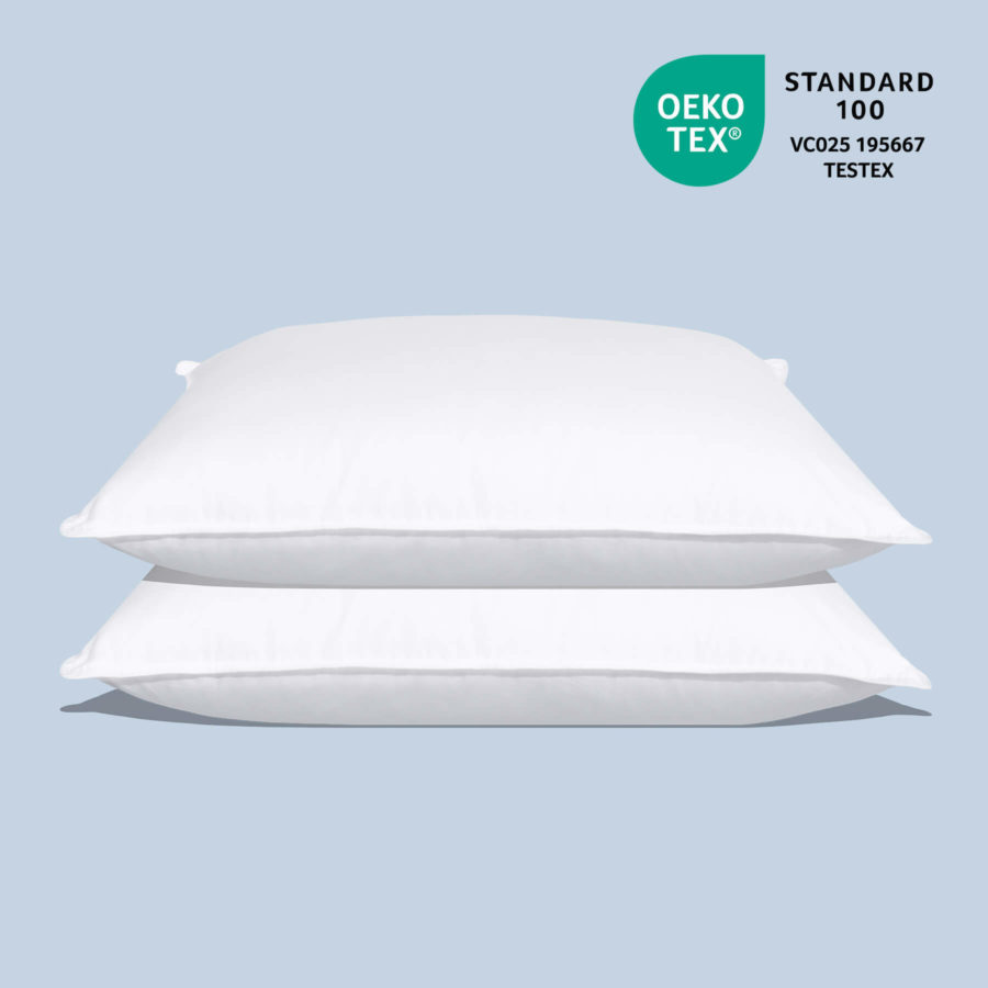 Front view of two Juno Down Alternative Pillows stacked on top of each other, with OEKO-TEX logo
