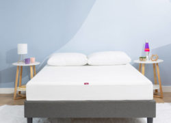 Juno mattress protector fitted to a Juno mattress in a bedroom